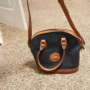 Dooney & bourke purse. Navy blue. Never used. Good shape